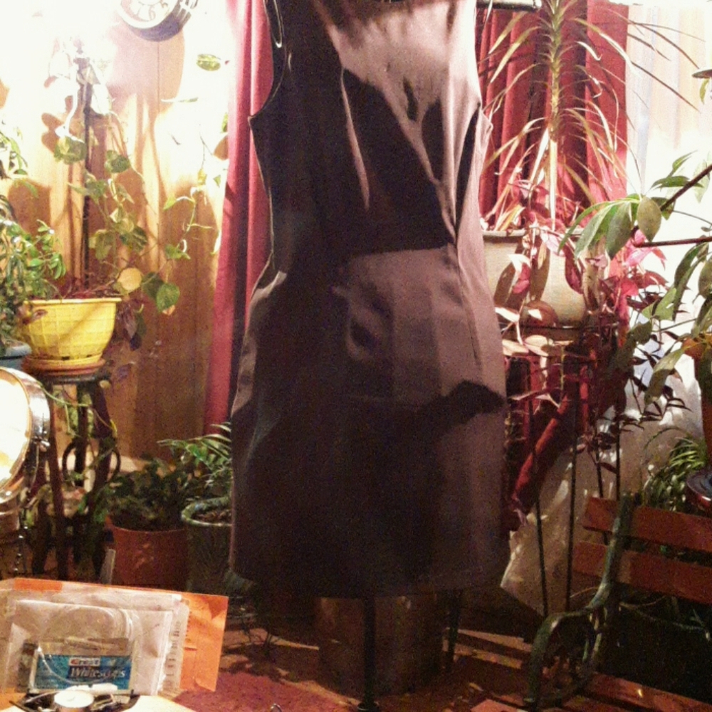 A beautiful brown pencil dress slit in the back